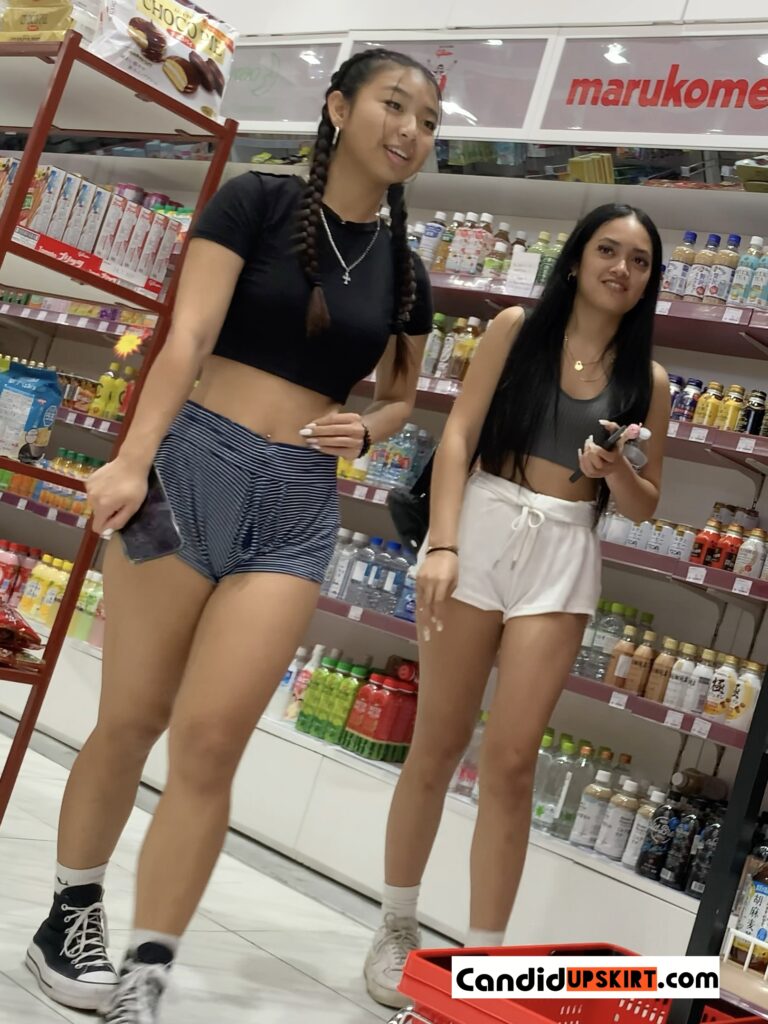 Asian girl in shorts with friends