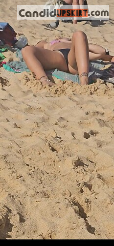 Hot blonde, tight bodied spreading cheeks in thong bikini - Photo 14